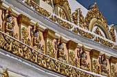 Myanmar - Sagaing, Umin Thounzeh (the 30 Caves), a colourful crescent-shaped colonnade within which there are 45 Buddha images. 